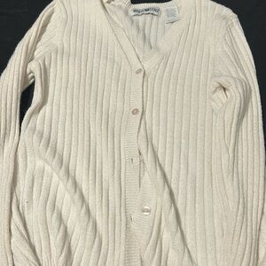 Woman’s white cardigan